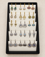 Evil Eye & Hamsa Earrings — Display of 15 Pairs